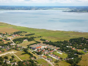 10 person holiday home on a holiday park in Blåvand